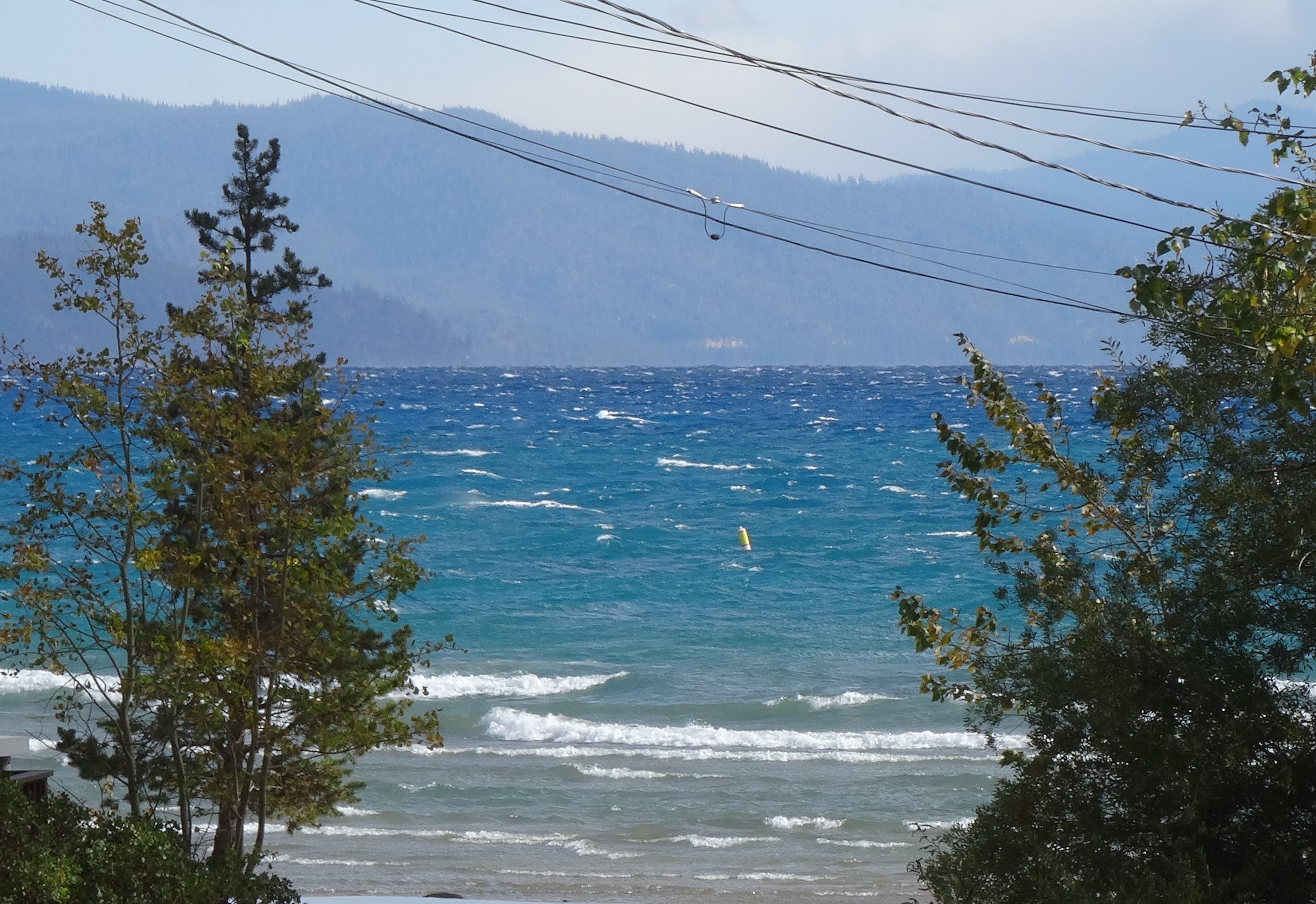 View of choppy Lake Tahoe from Rustic Cottage